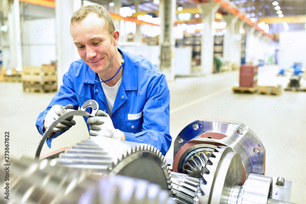 quality control in mechanical engineering - engineer controls dimensions  with a caliper gauge for tolerances and accuracy Stock Photo | Adobe Stock